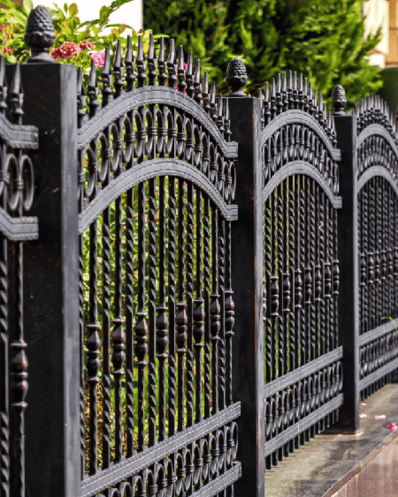 up close view of black ornamental steel fence