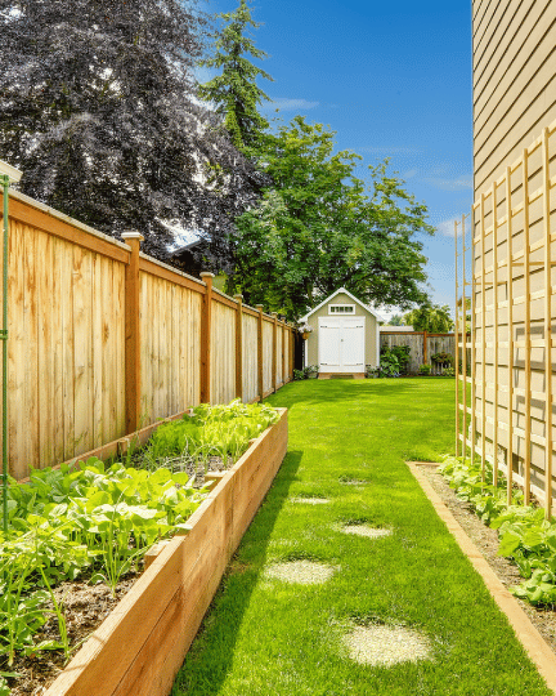 brown wooden fence next to brown house